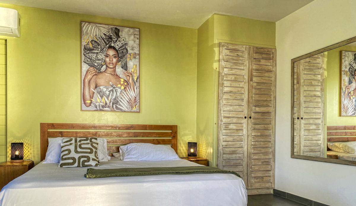 23.Location Villa piscine vue mer Deshaies Guadeloupe_Chambre 1 Rdc